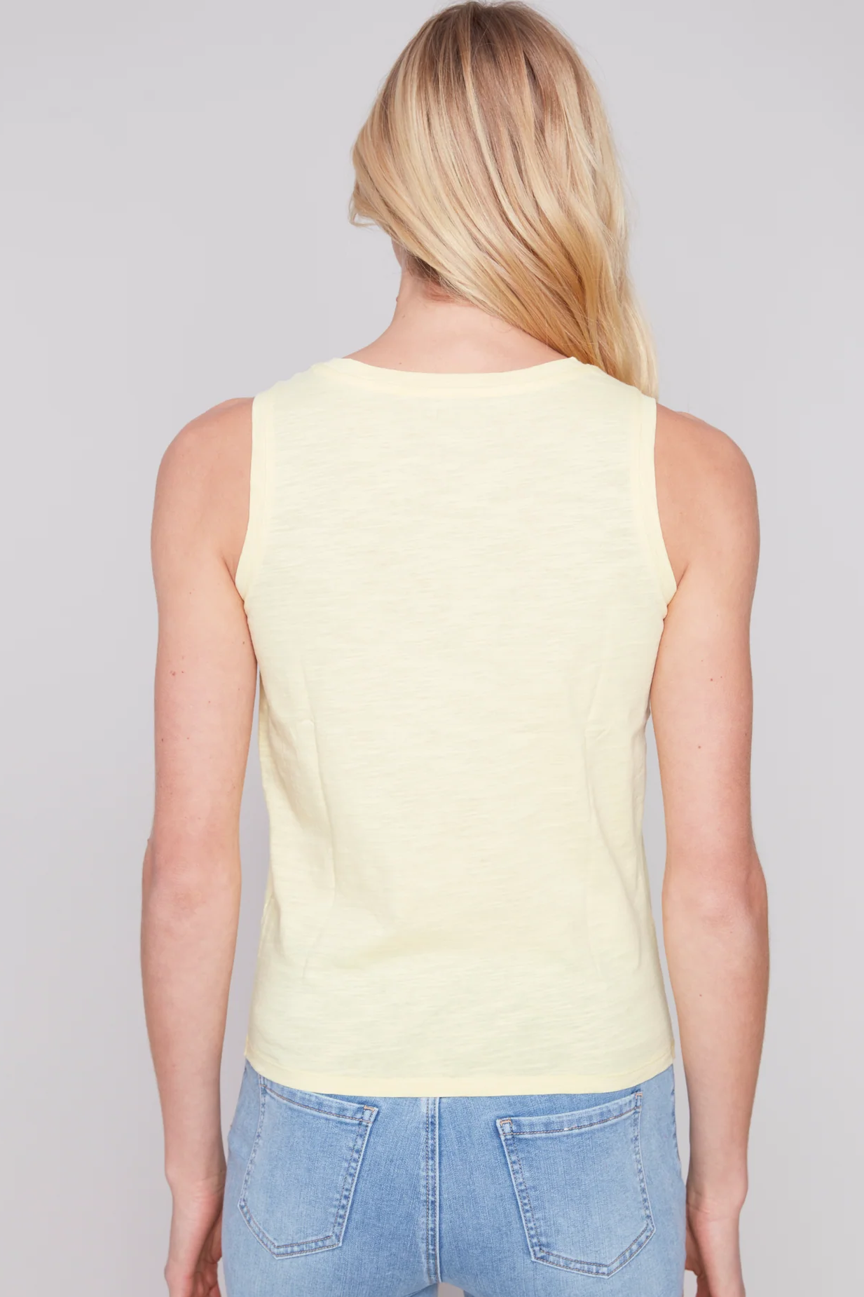 Sleeveless Tank Top With Twisted Hem At Front